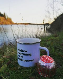 Mug and teacake on the shore of Loch Trool - Swim the Lochs/Creeside Escape