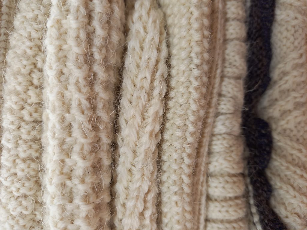 Samples of knitting using Blackface wool, produced for The Wool Gathering pilot project