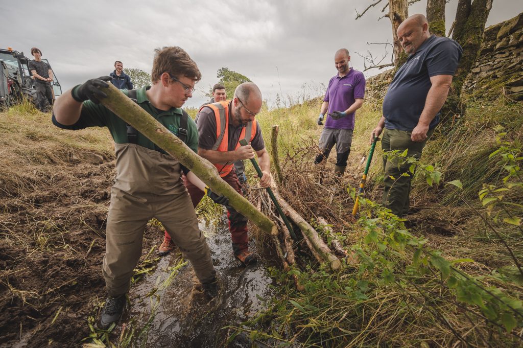 River restoration team working on a watercourse at Threave Estate.