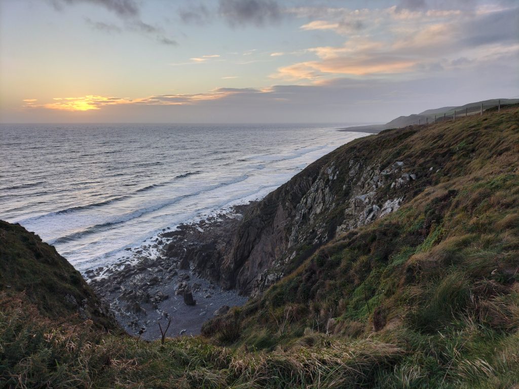 Clifftop view over the location of St Ninian's Cave.