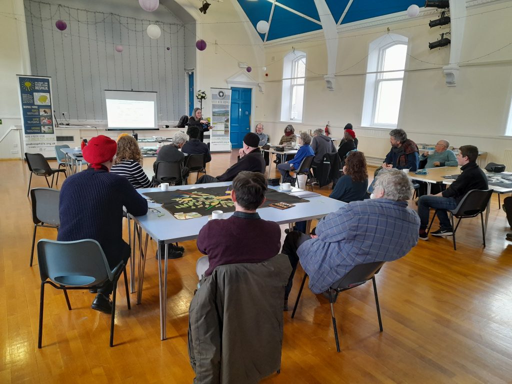 Wide view photo of Dr Joanne Tippett leading discussion at the Community Visioning Workshop at Sanquhar.